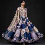 Lilac Moon ExpensiveE High Neck Cape Lehenga with 3D Floral Applique